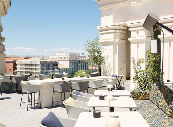 Rooftop cocktail bar at Azotea Cibeles with lounge seating for networking events.
