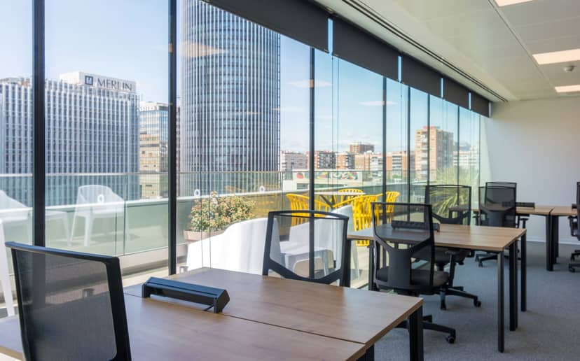 Castellana Lounge breakout space with terrace and floor-to-ceiling windows for event venue rentals.