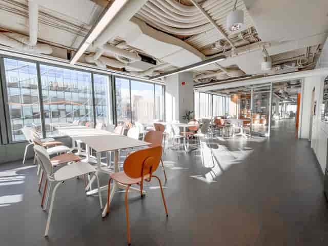 Sunny flexible breakout room for networking and collaborative workshops.