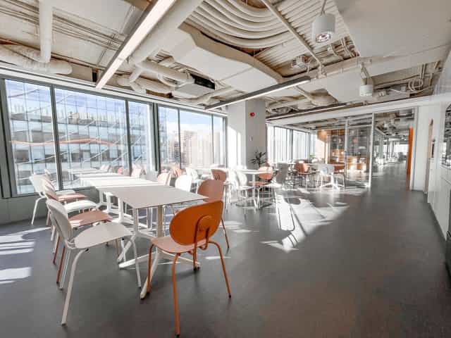 Sunny flexible breakout room for networking and collaborative workshops.