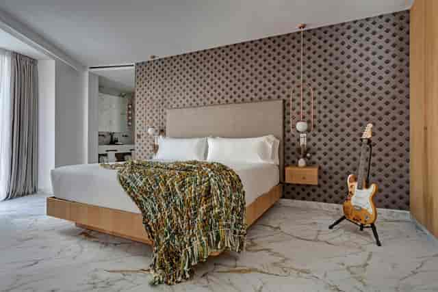 Luxury UMusic Hotel Madrid meeting room with display guitar for VIP events and conferences.