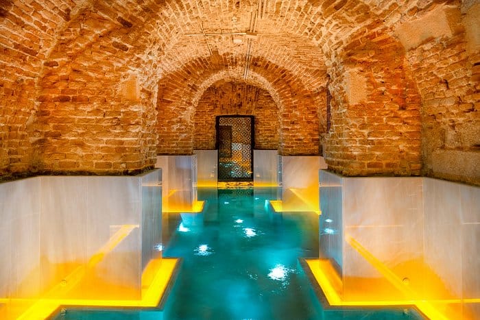 Luxury swimming pool at Pestana Plaza Mayor Madrid for corporate event wellness and relaxation.