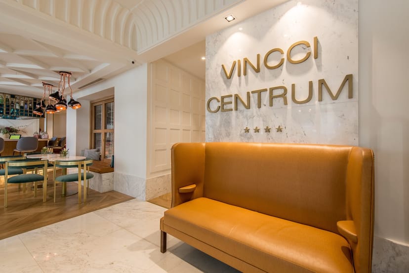 Boutique hotel lobby for event registration and corporate meet-and-greet venue.