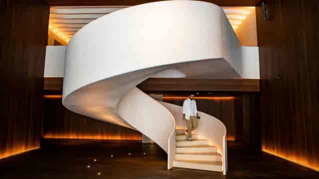 Madrid EDITION suite interior with dramatic architectural design for luxury event photoshoots.