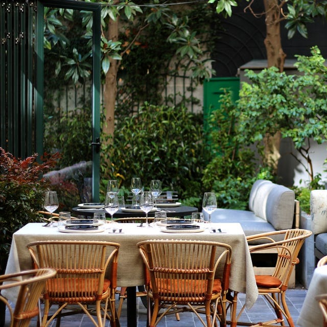 Lush garden terrace at Restaurante Tragaluz Madrid for high-end networking lunch or VIP dinner.