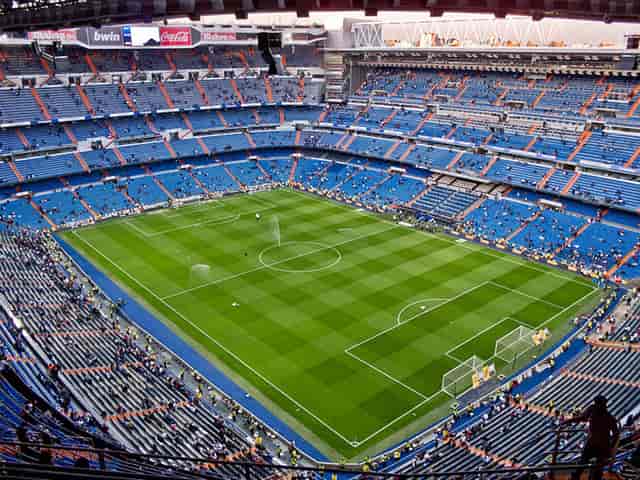 Santiago Bernabéu stadium pitch for corporate events and brand activations.