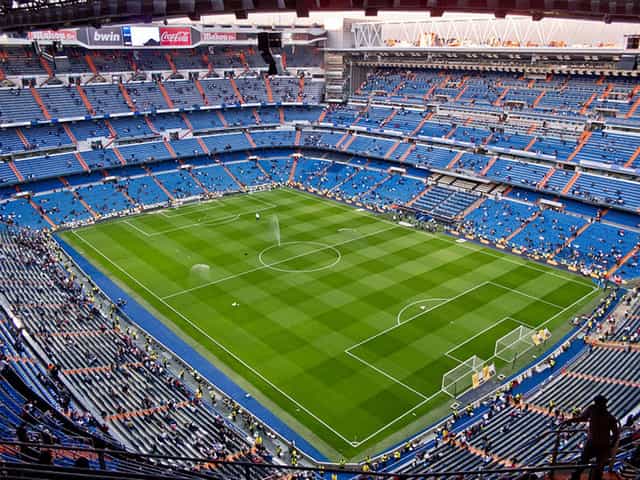 Santiago Bernabéu stadium pitch for corporate events and brand activations.