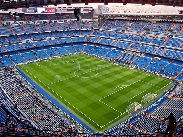 Santiago Bernabéu stadium pitch for corporate events and brand activations.