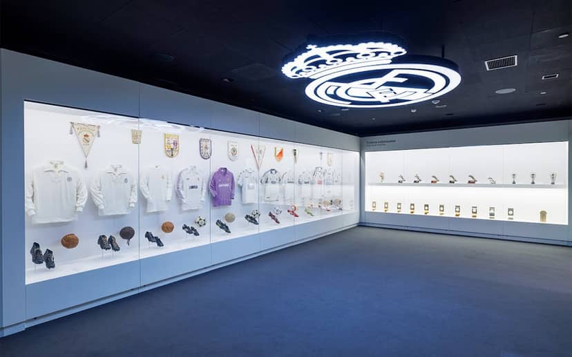 VIP reception space at Estadio Bernabéu with sleek museum lighting for corporate event branding.