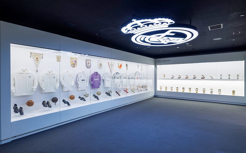 VIP reception space at Estadio Bernabéu with sleek museum lighting for corporate event branding.