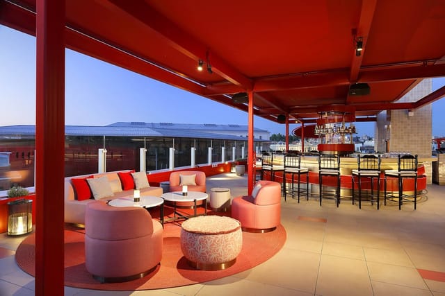Rooftop networking reception at Hard Rock Hotel Madrid, luxury VIP cocktail venue.