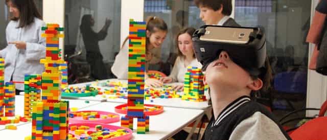 Interactive breakout workshop session with tactile tech for corporate team-building events.