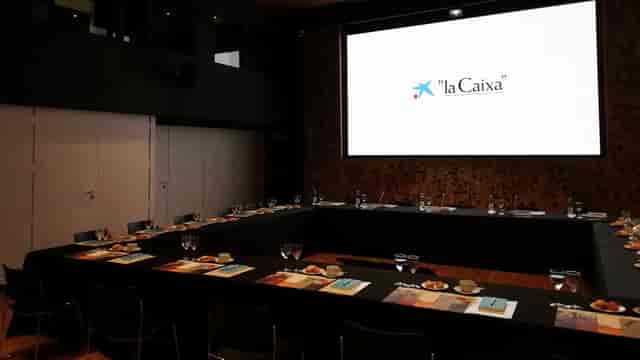 U-shape boardroom at CaixaForum Madrid for corporate presentations and business events.