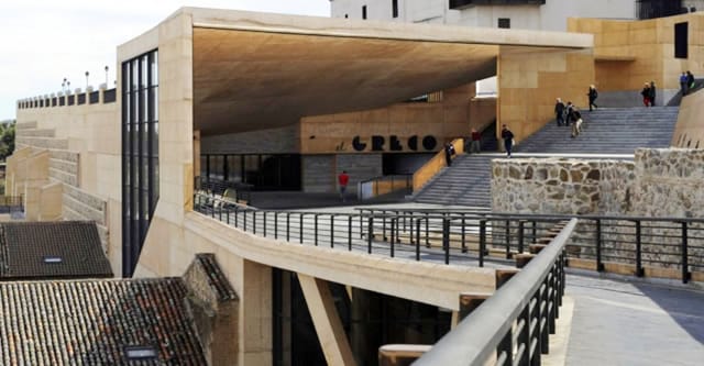 El Greco Conference Center entrance: modern architecture, ideal for event registration and networking.