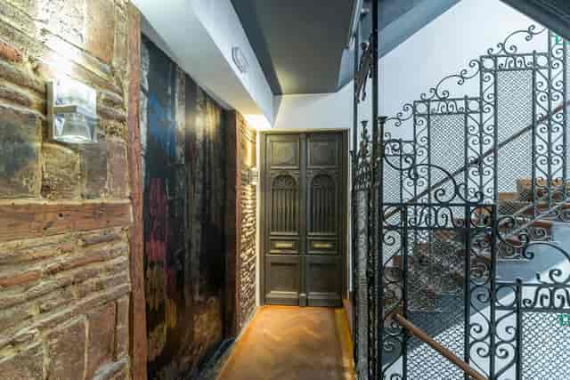 Bodega at Petit Palace Puerta del Sol: exposed brick boutique event space for unique venues.