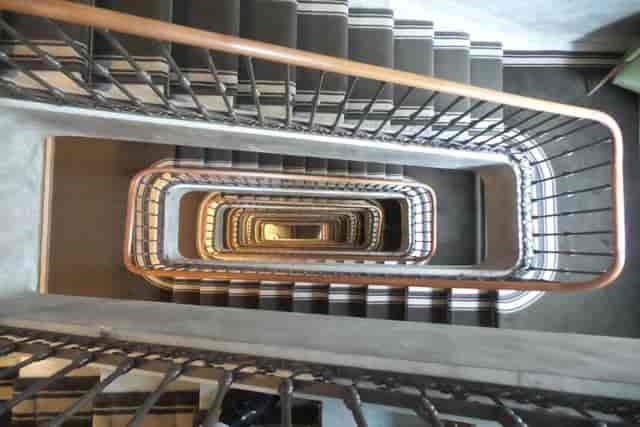 Staircase in Hotel Moderno Madrid TV lounge, event accessibility hazard.