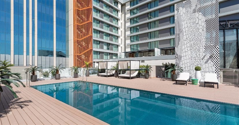 Modern outdoor pool deck at Barceló Imagine, ideal for VIP hospitality and networking events.