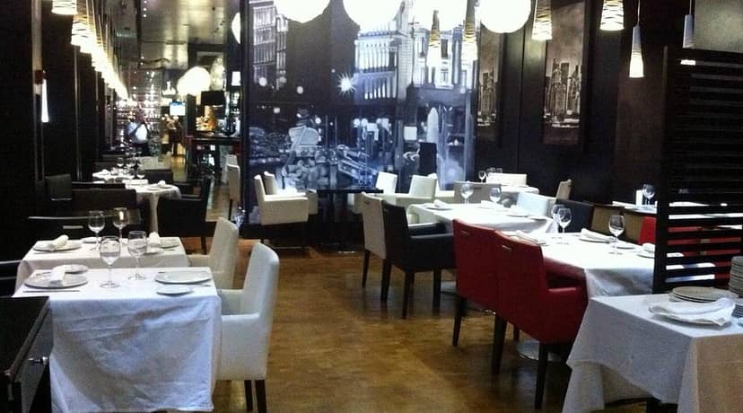 Arte 14 Restaurant: Upscale moody dining space for corporate dinners and VIP events.