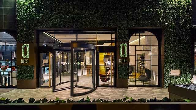 Arte 14 Restaurant entrance, boutique hotel design: luxury executive retreat and networking venue.