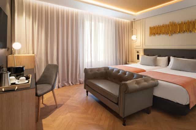 Hotel Catalonia Goya suite with functional executive workspace for business travel.