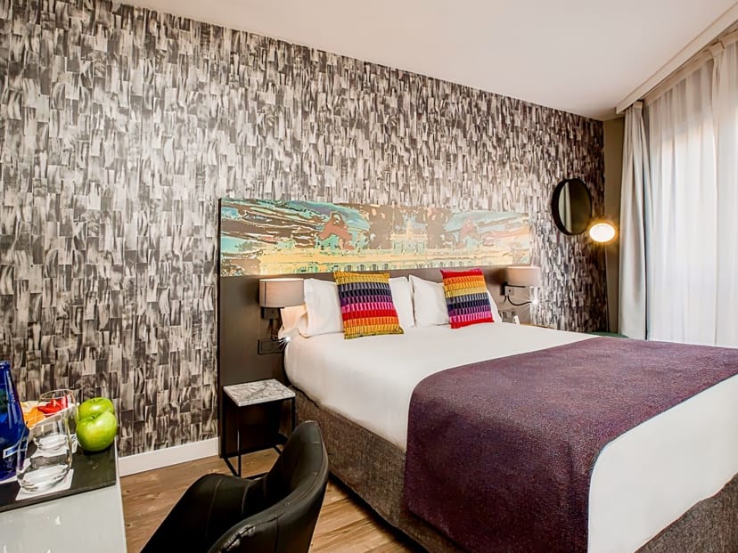 Modern Leonardo Boutique Hotel Madrid room with bold feature wall for design-forward event lodging.