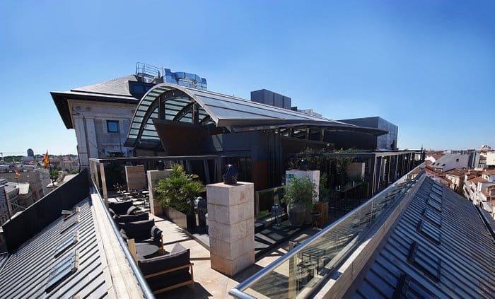 High-end rooftop hotel restaurant with panoramic views, ideal for networking events and receptions.