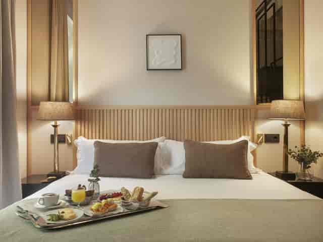 Upscale in-room breakfast setup at Hotel Único Madrid for luxury incentive travel rewards.