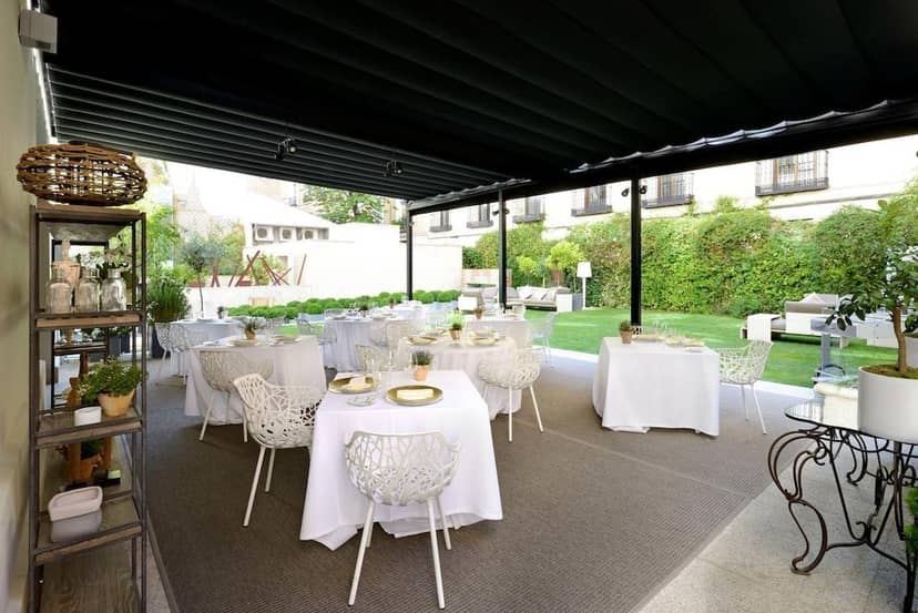 Upscale outdoor hotel terrace for corporate luncheons and gala receptions.