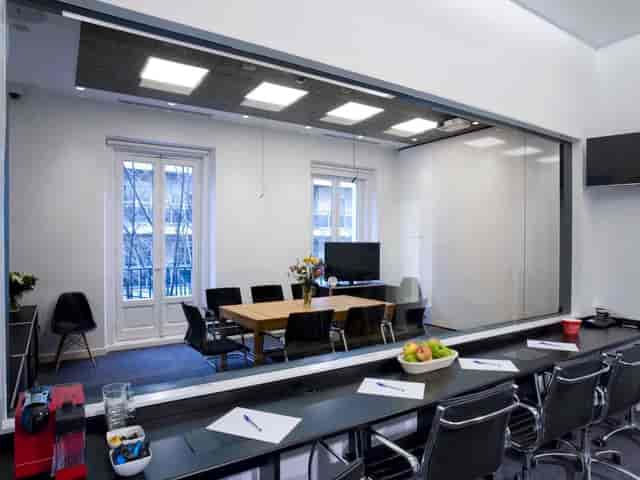 Modern ZuriCenter glass-walled conference room for business meetings and corporate events.