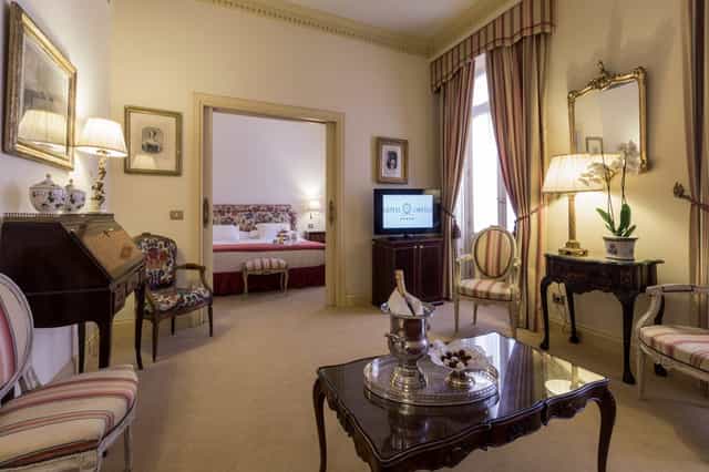 Luxury Salón de Espejos suite in Heritage Madrid Hotel for VIP board meetings and executive travel.