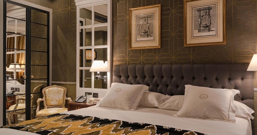 Luxury Heritage Madrid Hotel suite for executive retreats and VIP events.