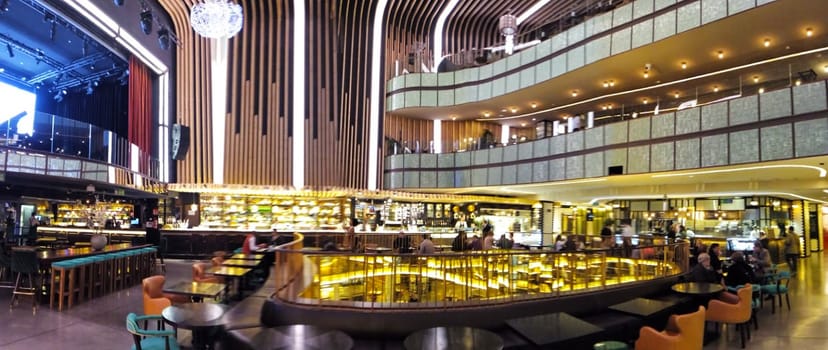 Platea Madrid multi-level luxury venue with dramatic lighting for cocktail receptions or events.
