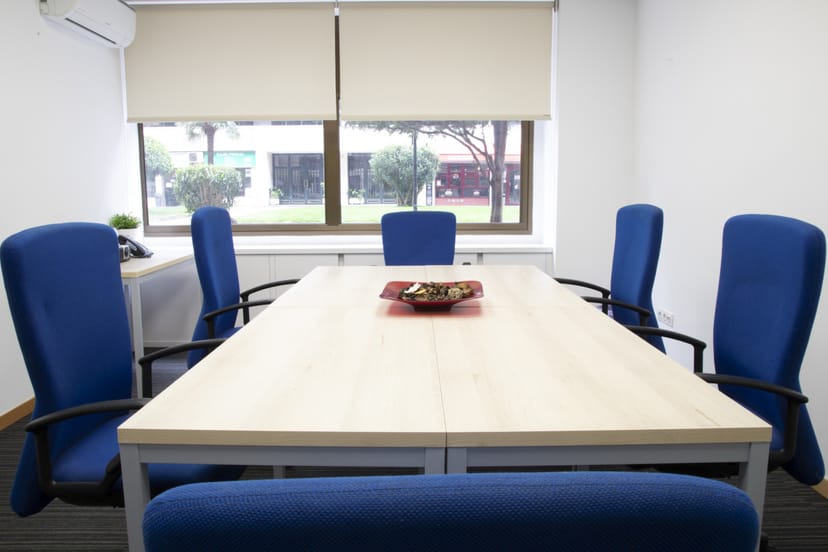 Boardroom-style meeting room in MC4, professional corporate space for small group meetings.