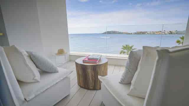 Executive breakout session at Nobu Hotel Ibiza Bay rooftop, luxury corporate event venue.