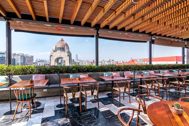 Open-air rooftop venue at Terraza Cha Cha Chá for corporate cocktail hours and networking events.