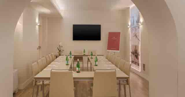 U-shape boardroom at NH Collection Roma for executive meetings and corporate strategy sessions.