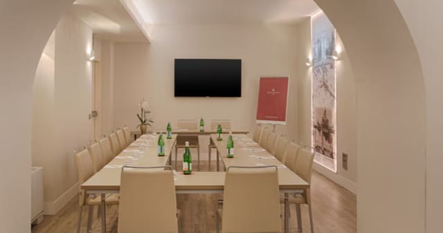 U-shape boardroom at NH Collection Roma for executive meetings and corporate strategy sessions.