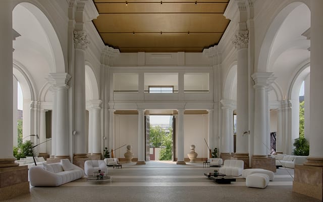 Architectural lobby at NH Collection Milano CityLife for upscale cocktail receptions and galas.