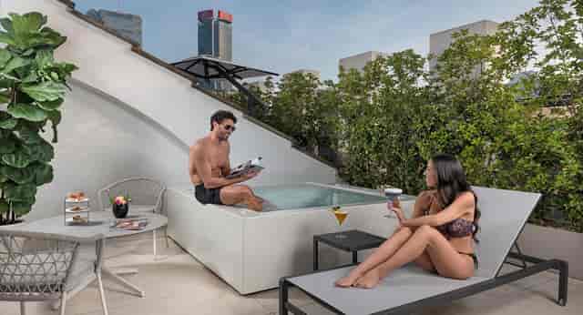 Luxury rooftop pool suite at NH Collection Milano CityLife for VIP executive retreats and events.
