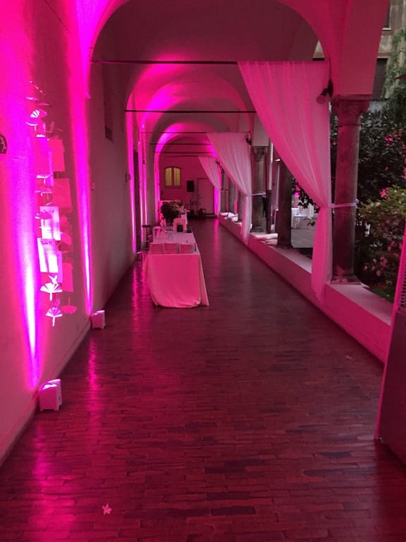 Uplit drapery in Spazio Cairoli corridor for gala and corporate evening event.