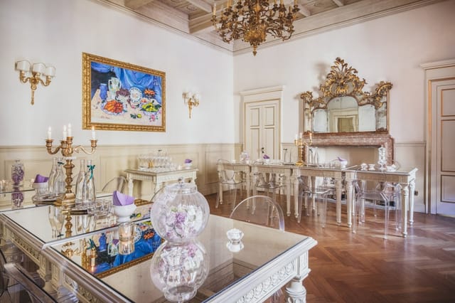 Sala Magenta at Spazio Cairoli with ghost chairs for luxury meetings and private dining.