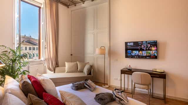 Upscale boutique guest room at Hotel Navona for VIP speakers and corporate retreats.