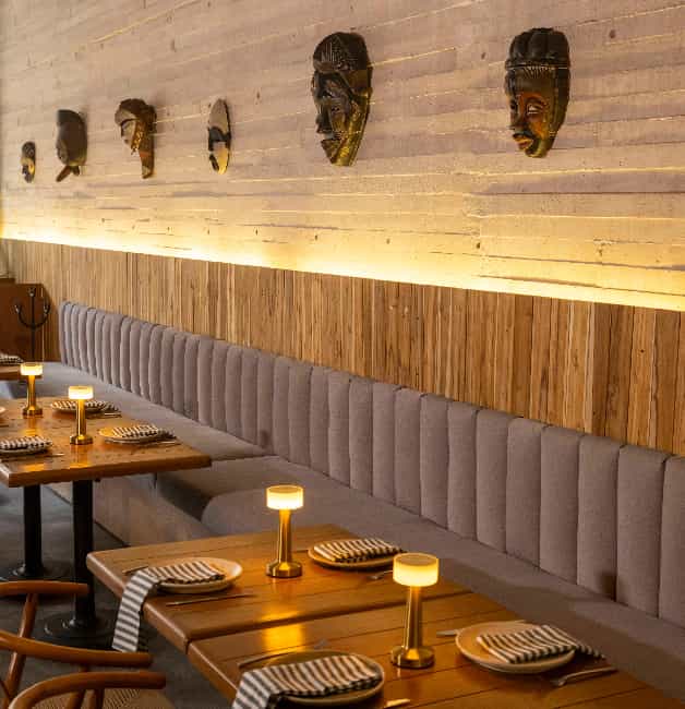 Sophisticated ZUZU Restaurant private dining and networking event space with banquette seating.