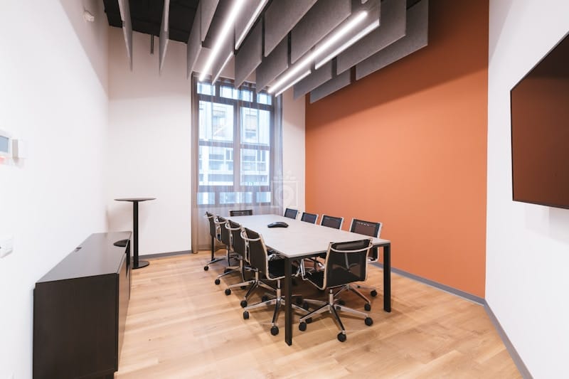 Modern boardroom with ergonomic seating for strategy sessions and hybrid meetings.