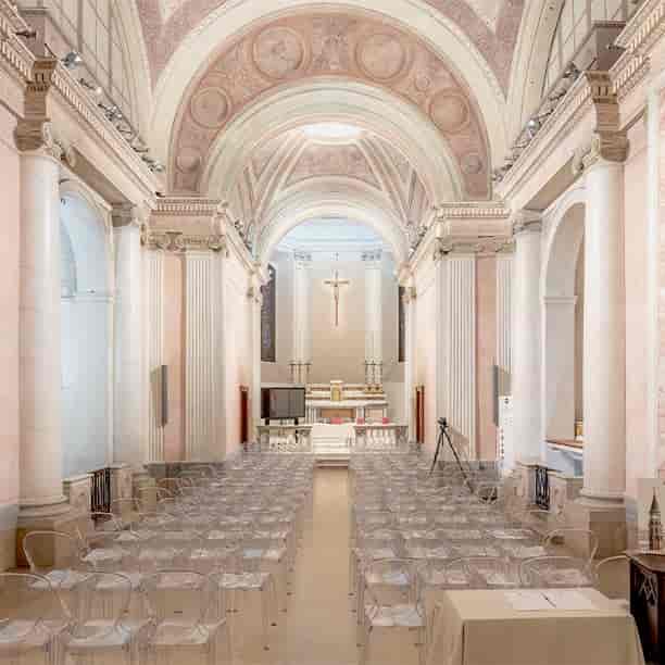 Sala Duomo high-ceilinged venue, theater-style setup for corporate events and conferences.