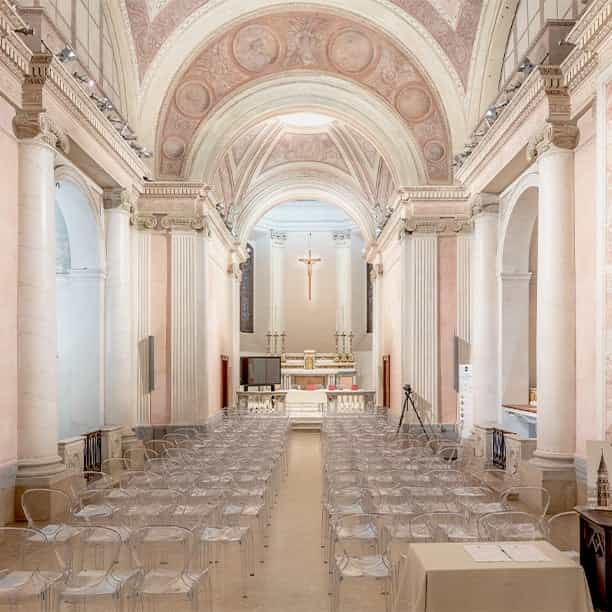 Sala Duomo high-ceilinged venue, theater-style setup for corporate events and conferences.