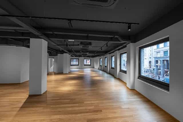 Industrial event space, Spazio San Babila, hardwood floors, corporate workshop and gallery venue.
