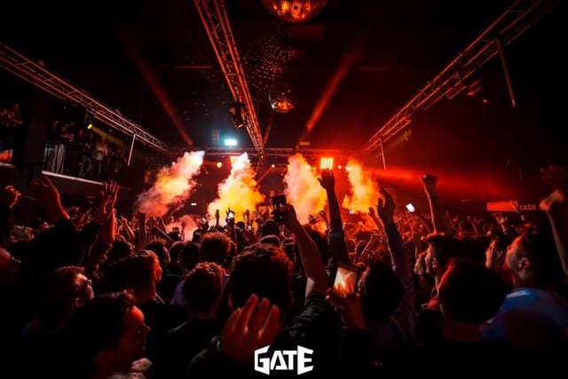 Nightclub event at Gate Milano with dynamic lighting and pyrotechnics for nightlife activation.