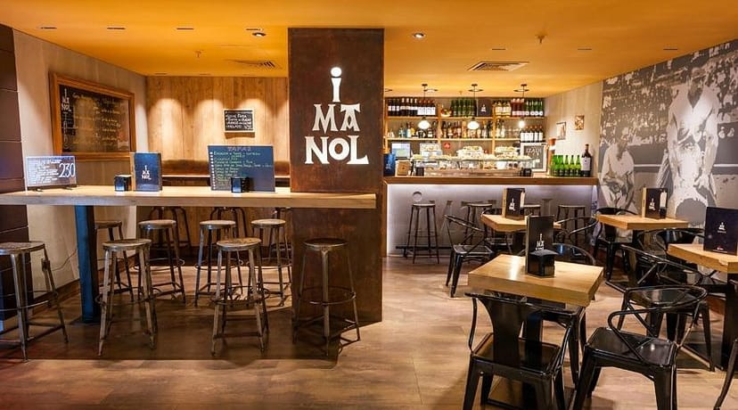 Rustic-chic high-top bar for informal networking and corporate reception events.