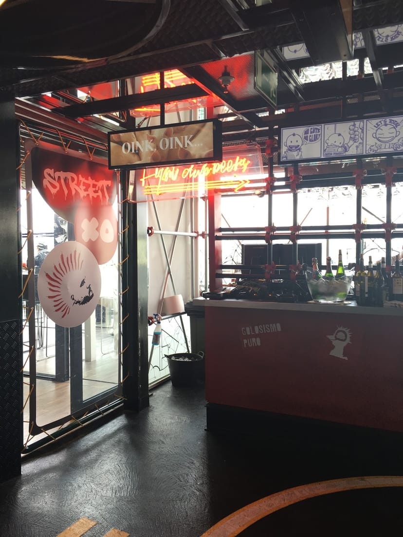 StreetXo neon industrial networking reception, urban F&B event setup.